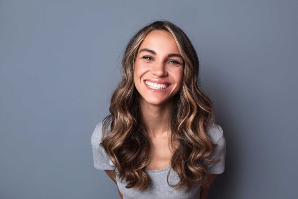 smiling woman with composite bonding