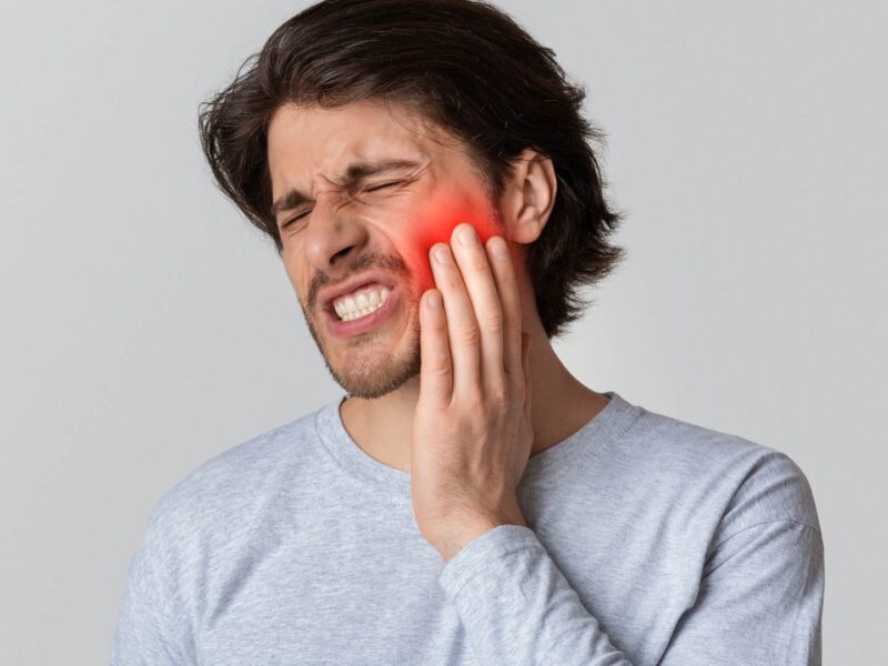 man with tooth pain dental emergency