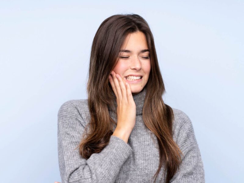 woman with tooth pain